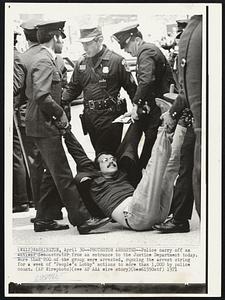 Protestor Arrested -- Police carry off an antiwar demonstrator from an entrance to the Justice Department today. More than 200 of the group were arrested, running the arrest string for a week of "People's Lobby" actions to more than 1,000 by police count.