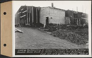 Contract No. 107, Quabbin Hill Recreation Buildings and Road, Ware, looking southwesterly at temporary shelter for utility building, wooden boiler room in center, Ware, Mass., Dec. 9, 1940