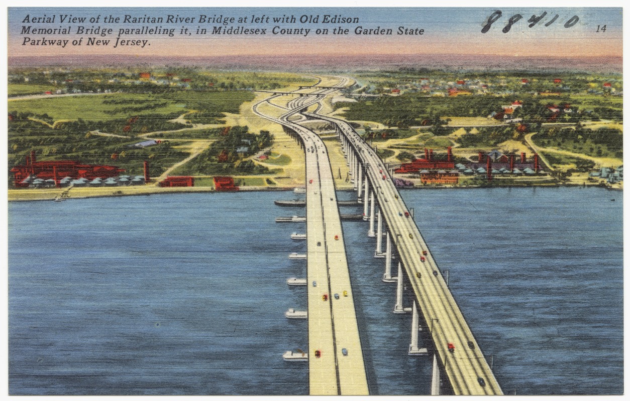 Aerial view of the Raritan River Bridge at left with Old Edison Memorial Bridge paralleling it, in Middlesex County on the Garden State Parkway of New Jersey