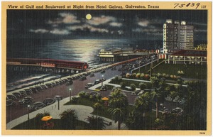 View of gulf and boulevard at night from Hotel Galvez, Galveston, Texas