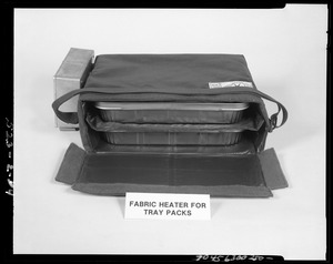 Fabric heater for tray packs