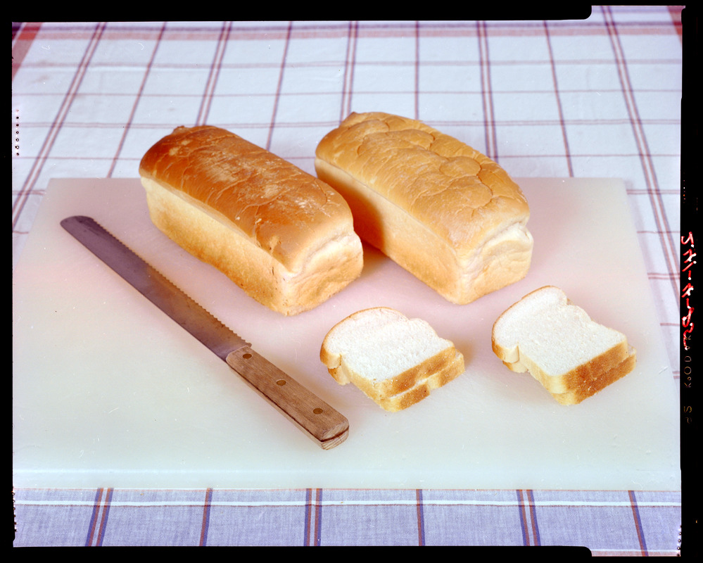FEL two loafs of bread on cutting board