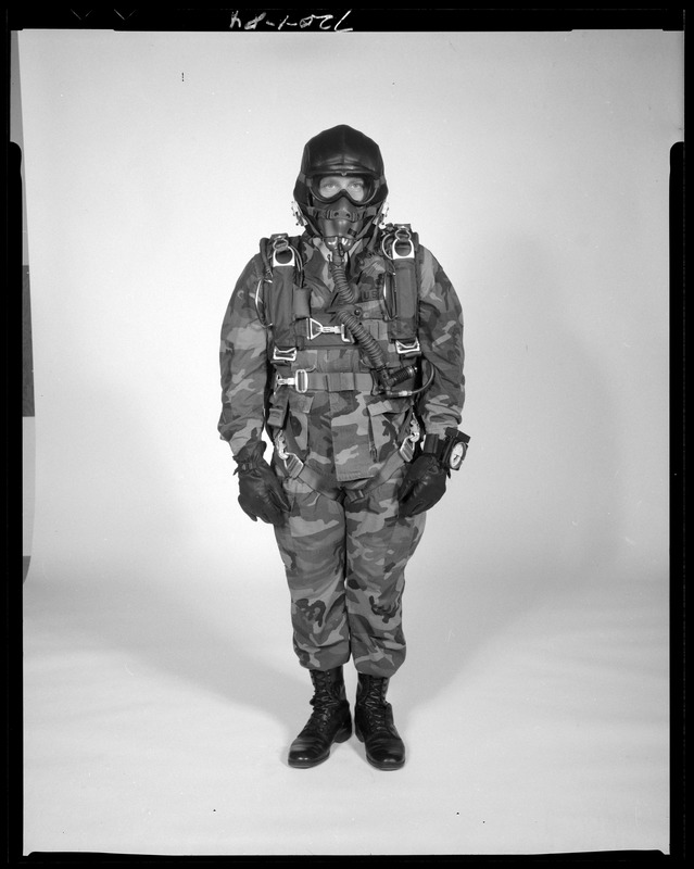 AMEL basic military free fall parachute system on jumper, front view -  Digital Commonwealth
