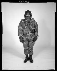 AMEL basic military free fall parachute system on jumper, front view