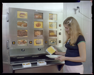 Keene vending machine showing cooked items w/model