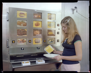 Keene vending machine showing cooked items w/model