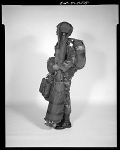 AMEL, soldier rigged with stinger missile, side view