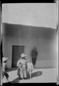 Peru, on the journey from Mollendo to Arequipa, Indians selling llama and alpaca skins at the station