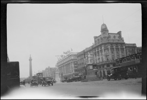 Dublin, Ireland, O'Connell St. showing the Nelson monument in the distance and Clery's store