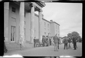 The garden party, Pres. And Mrs. De Valera receiving the Archbishop of Dublin in front of the Vice-regal Lodge, Phoenix, Dublin. Meeting of the World Federation of Education Associations in Dublin