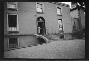 Mrs. Augustine Henry (Elsie) at the door of her home, Sandfort Road, Ranelagh, Dublin