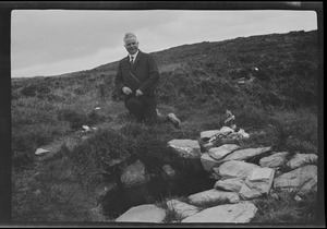 Mr. O'Kane at the "Holy Well" near the Grianan of Aileach, Derry, Ireland