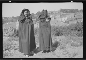Women with hooded cloaks