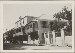 A street in Bridgetown, Barbados, B. W. I., August (Dinah and her poodle)