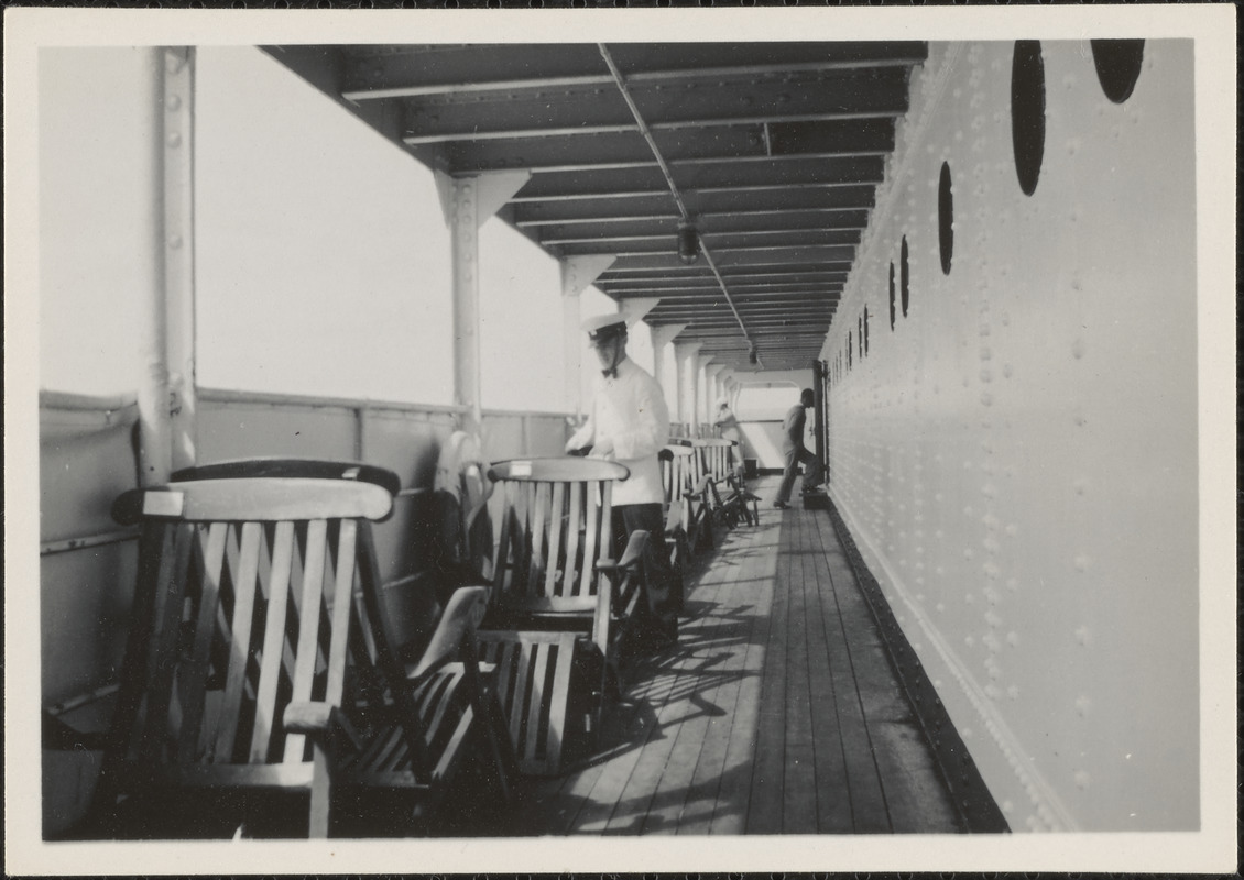 Steward arranging chairs after the big storm, S. S. American Trader ...