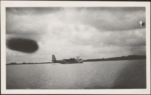 Side view of airplane on the water