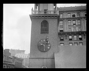 Old South Church clock being painted