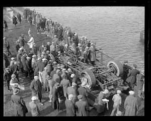 The truck in which two men met their fate when it plunged into the Mystic River at Chelsea Bridge