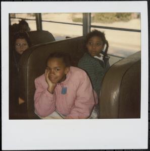 Two girls on a school bus