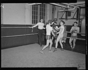 Youth in boxing ring
