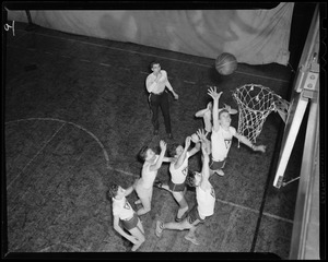 Youth playing basketball