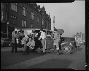 Youth unloading a car