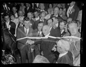 Leverett Saltonstall in a crowd, shaking hands