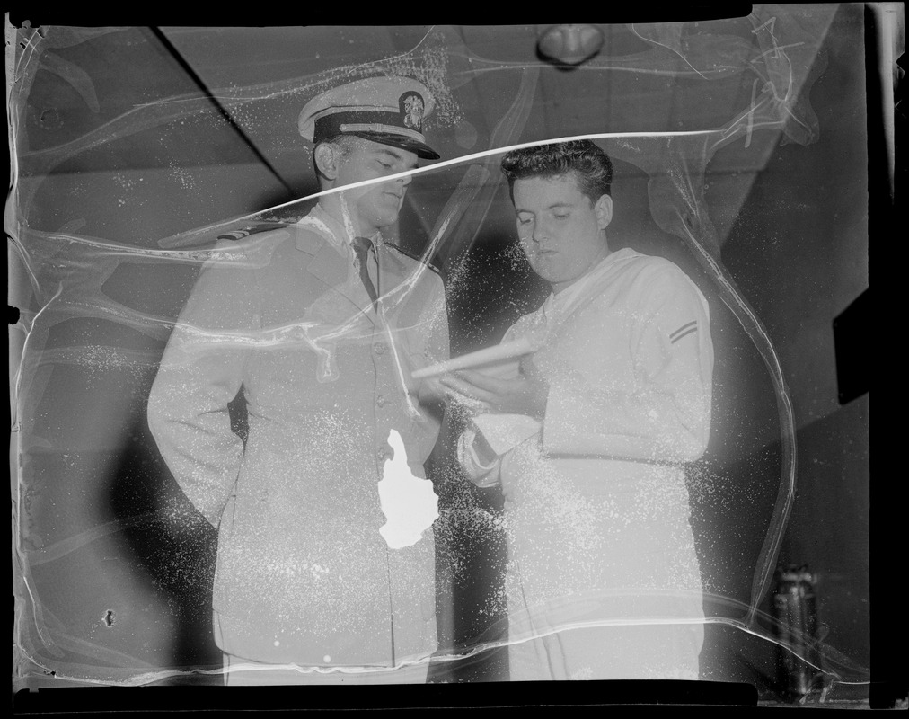 U.S.S. Bennington - board of inquiry. Military personnel inspecting papers