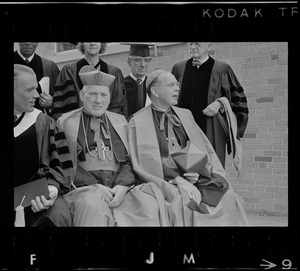 Recipients of honorary degrees at Boston College commencement, seated from left, Gov. Francis W. Sargent, Richard Cardinal Cushing, Terence Cardinal Cooke, standing from left, A. Philip Randolph, Katharine Graham, R. Buckminster Fuller, Henry L. Shattuck