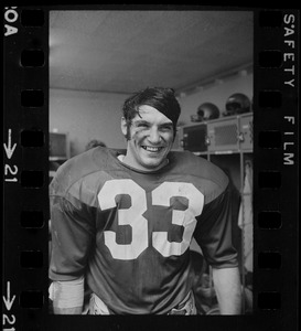 Boston College halfback Fred Willis in locker room after win against Holy Cross