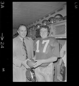 Boston College football coach Joe Yukica and quarterback Frank Harris in locker room after win against Holy Cross