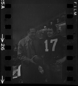 Boston College football coach Joe Yukica and quarterback Frank Harris in locker room after win against Holy Cross