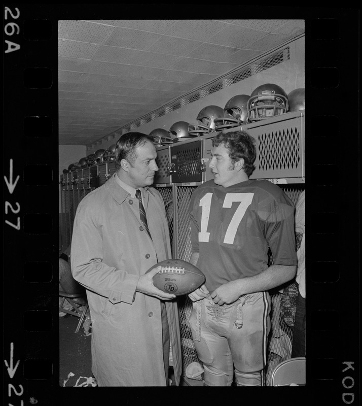 Boston College football coach Joe Yukica and quarterback Frank Harris in locker room after win against Holy Cross