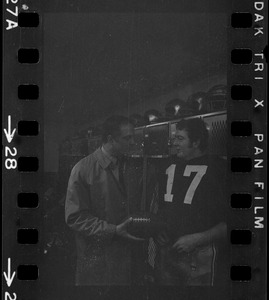 Boston College football coach Joe Yukica and quarterback Frank Harris in locker room after win against Holy Cross