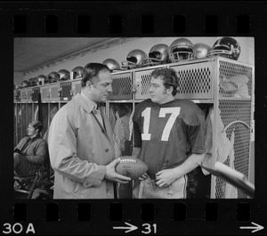 Boston College football coach Joe Yukica and quarterback Frank Harris in locker room after win against Holy Cross