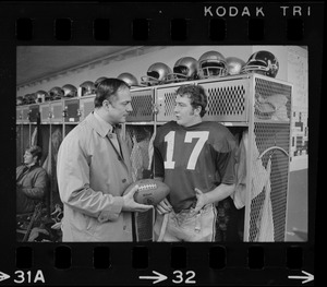 Boston College football coach Joe Yukica and quarterback Frank Harris in locker room after win against Holy Cross