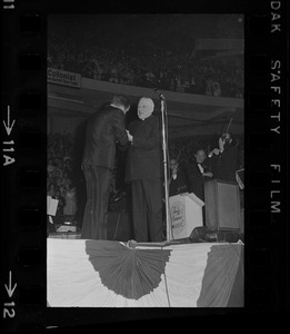 Mike Douglas and Richard Cardinal Cushing on stage at Blinstrub's Village benefit show, Boston Garden