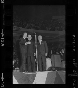 Mike Douglas, Richard Cardinal Cushing, and Stanley Blinstrub on stage at Blinstrub's Village benefit show, Boston Garden