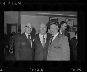 Pat O'Brien flanked by two unidentified men at Blinstrub's Village benefit show, Boston Garden