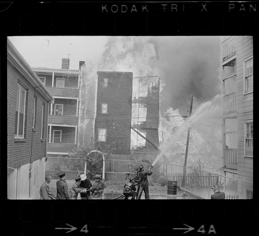 Firemen battling fire on Bellflower Street, Dorchester