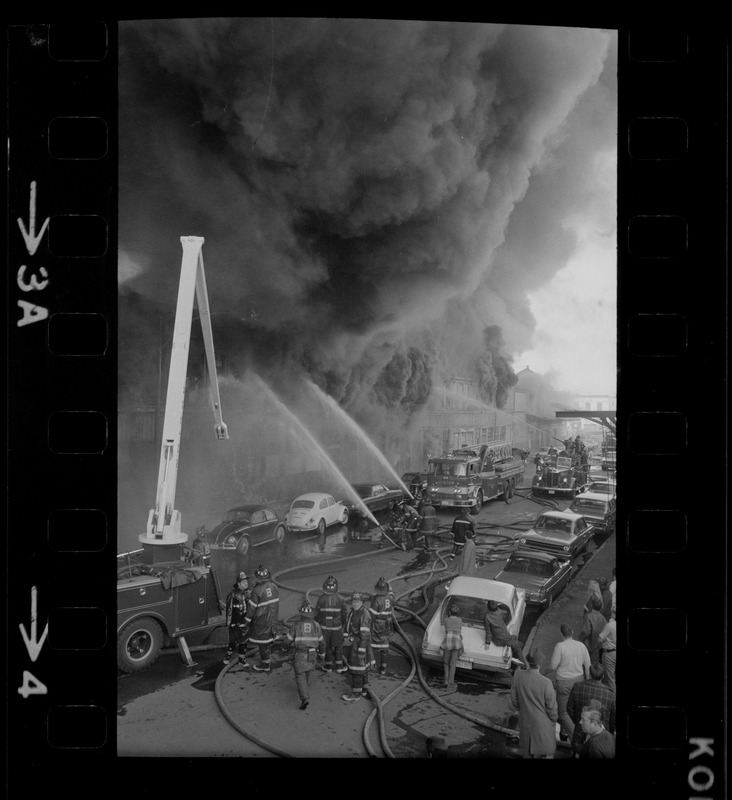 Firemen battling fire on Clinton Street, Boston