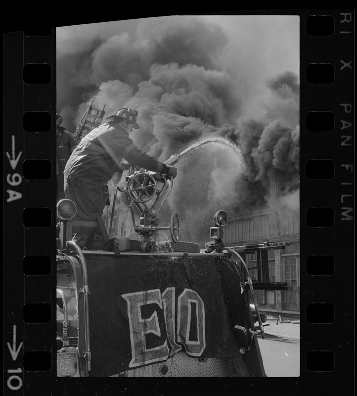 Firemen battling fire on Clinton Street, Boston