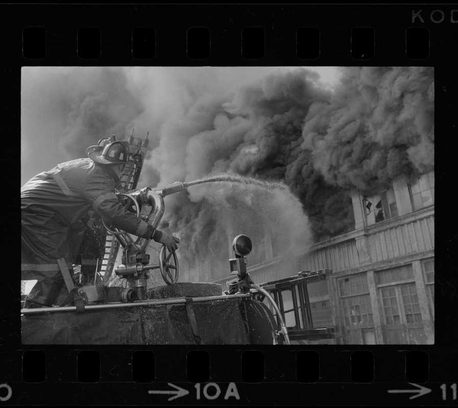 Firemen battling fire on Clinton Street, Boston