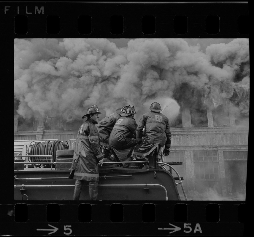 Firemen battling fire on Clinton Street, Boston