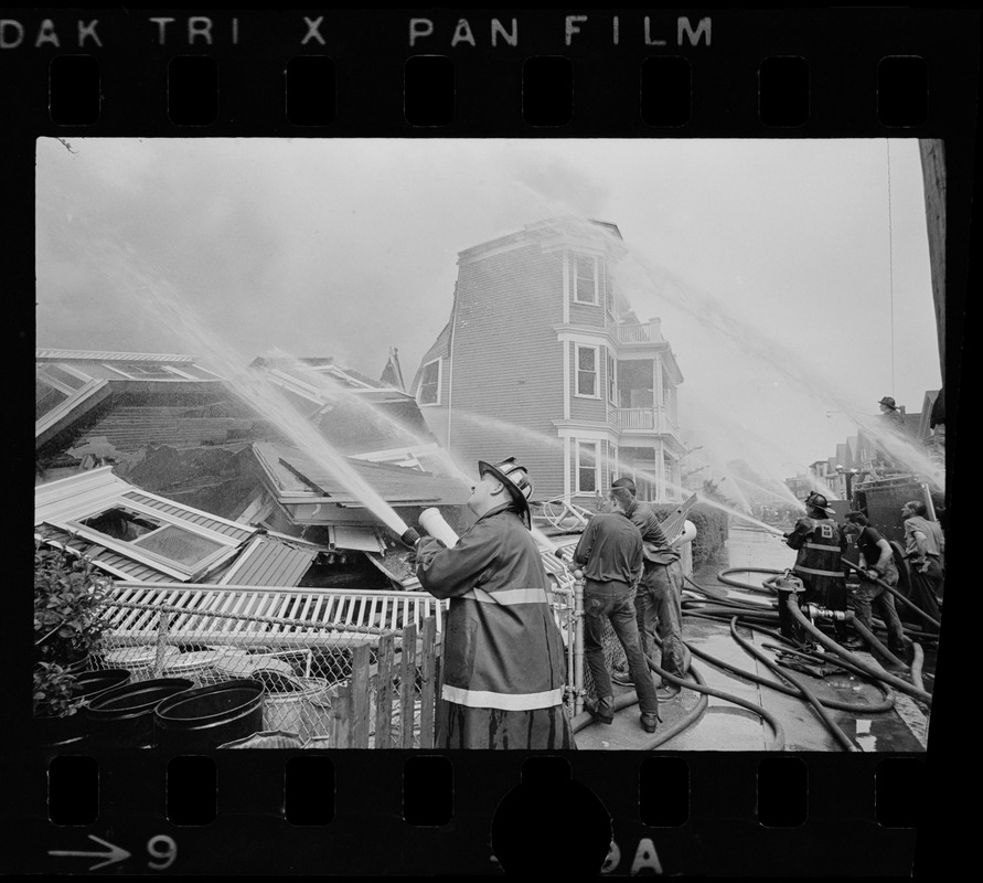 Firemen putting out fire with water pumps, Bellflower Street, Dorchester, MA