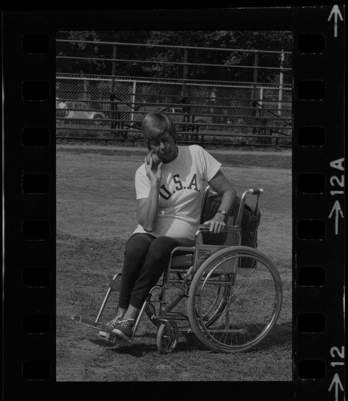 Bea Anderson, Olympic wheelchair champ from West Brookfield, in shot put event at Boston's "Happening for the Handicapped" on Boston Common