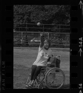 Bea Anderson, Olympic wheelchair champ from West Brookfield, in shot put event at Boston's "Happening for the Handicapped" on Boston Common