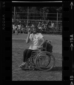 Bea Anderson, Olympic wheelchair champ from West Brookfield, in shot put event at Boston's "Happening for the Handicapped" on Boston Common