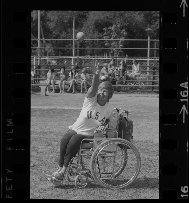 Bea Anderson, Olympic wheelchair champ from West Brookfield, in shot put event at Boston's "Happening for the Handicapped" on Boston Common