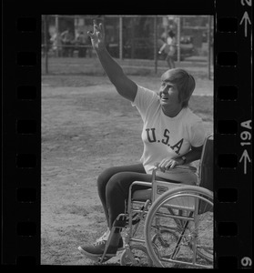 Bea Anderson, Olympic wheelchair champ from West Brookfield, in shot put event at Boston's "Happening for the Handicapped" on Boston Common